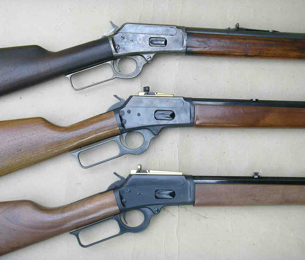 Model 1894 rifles (top to bottom): original 1894 era, 1990’s era .45 Colt Cowboy Limited Carbine and 2016 New York production .45 Colt Cowboy Limited Carbine.